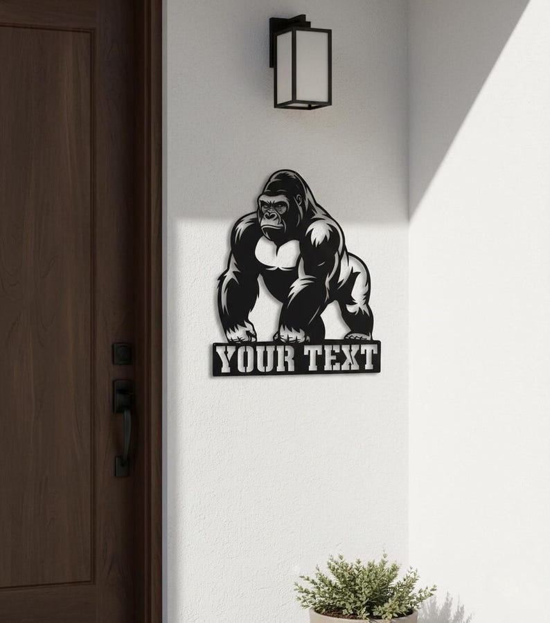 a wall art depicting a gorilla, with the text "YOUR TEXT" below it.