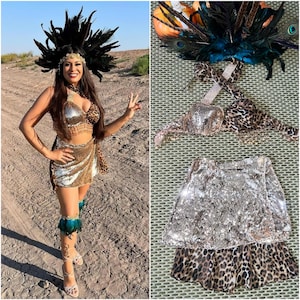 May include: A striking costume set with a sequined crop top and skirt, complemented by leopard print details. The outfit includes a feathered headdress and leg warmers, ideal for a performance or festival.