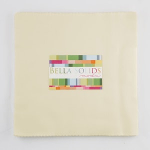 May include: A 10-inch square of cream-colored fabric with a Bella Solids Moda label.