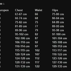 May include: A size chart for suits, with measurements in centimeters for chest, waist, hips, and height. Sizes range from 140 cm to 4X Large, with corresponding European sizes. The chart is on a dark background.