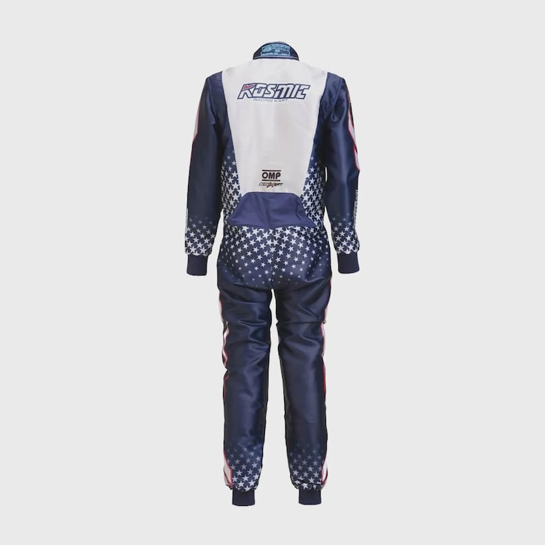 May include: A navy blue racing suit with white and red accents. The suit features a white upper back panel with the word "KOSMIC" in blue. The lower back and legs are navy blue with a white star pattern. The suit has red stripes down the sides.