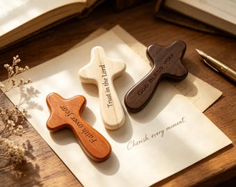 An olive wood comfort cross, a gift of encouragement and solace, is a handheld cross that can be given as a gift to a friend,Team gift