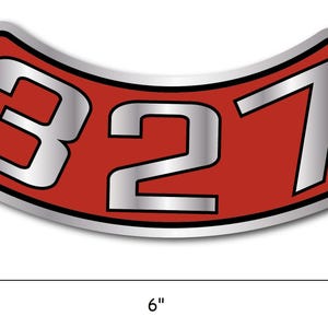 May include: A red and silver curved sticker with the number "327" in silver. The sticker is approximately 6 inches wide and has a silver border. The sticker is likely for a vehicle or other equipment.