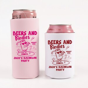 May include: Two beverage insulators, one pink and one white, each holding a can. The pink insulator reads "BEERS AND Birdies" with a golf-themed graphic and "JACK'S BACHELOR PARTY". The white insulator has the same design.