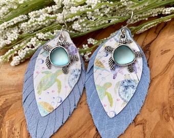 Sea turtle earrings in ocean blues and soft sea greens. Hypoallergenic Hook Style, Two fringe layers with sea turtle charm