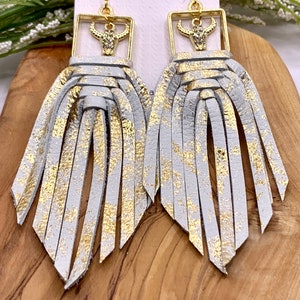 Boho Weaved Fringe Leather Earrings w/ Gold Shimmer Highlights & Rhinestone Bull Charm. Lightweight, Hypoallergenic, Southwestern Cowgirl.