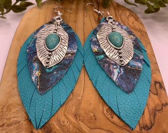 Silver & Turquoise Fringe Leather Earrings with a Turquoise Tone Charm. Southwestern and Western Cowgirl. Hypoallergenic Hook. Long fringe.