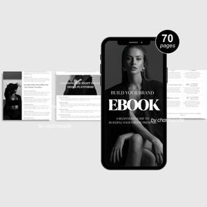 Puede incluir: Imagen en escala de grises de un smartphone que muestra un ebook titulado "Build Your Brand". La portada del ebook presenta a una mujer y el texto "EBOOK" en letras blancas. El ebook tiene 70 p&aacute;ginas y es una gu&iacute;a para principiantes sobre c&oacute;mo construir una presencia en l&iacute;nea.