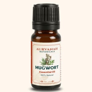 May include: A brown glass bottle of Mugwort essential oil with a black cap. The label features the text "AURVANAH BOTANICALS" and "MUGWORT Essential Oil 100% Natural". The label has a red border and a botanical illustration.