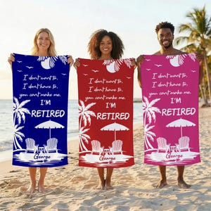 May include: Three beach towels in blue, red, and pink, each with a white design of palm trees, beach chairs, and an umbrella. The towels have the text "I'M RETIRED" and a personalized name.