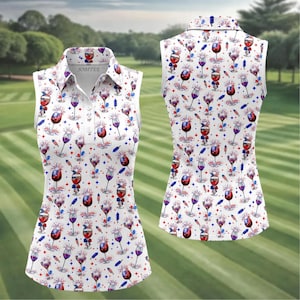May include: A sleeveless polo shirt with a white base featuring an all-over print of wine glasses filled with red, white, and blue patriotic patterns, small fireworks, and stars. The collar has a button placket with the text JOBITEE visible inside.