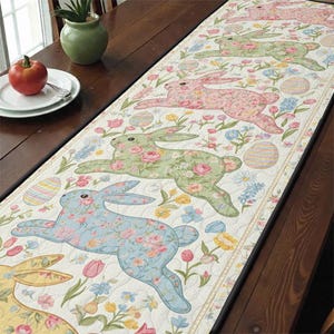 May include: Easter-themed table runner featuring floral-patterned bunnies in pink, green, and blue, interspersed with Easter eggs and flowers. The runner is set on a dark wooden table, adding a touch of spring decor.