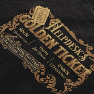 May include: Black t-shirt with a gold-colored "Golden Ticket" design. The design includes the text "Helpdesk's Golden Ticket" and other text, including "Valid for Frustrated User" and "Get it online for free! No ticket, no support!"