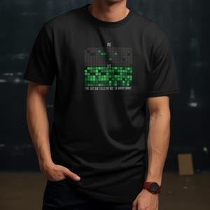 Black T-shirt with green commit grid for programmers and coders.