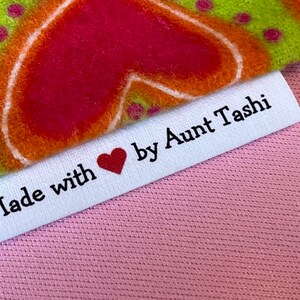 Custom   Larger(for 2 names)Precut Custom, fray-less, folded sewing labels/tags with heart graphic for personal touch!*