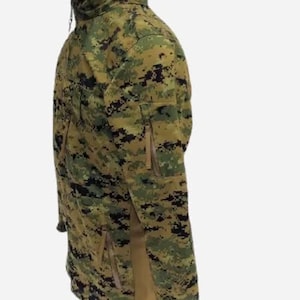 May include: A camouflage jacket in shades of green, brown, and black. The jacket features a high collar, multiple pockets, and a zipper closure. The fabric has a pixelated pattern, typical of military-style clothing.