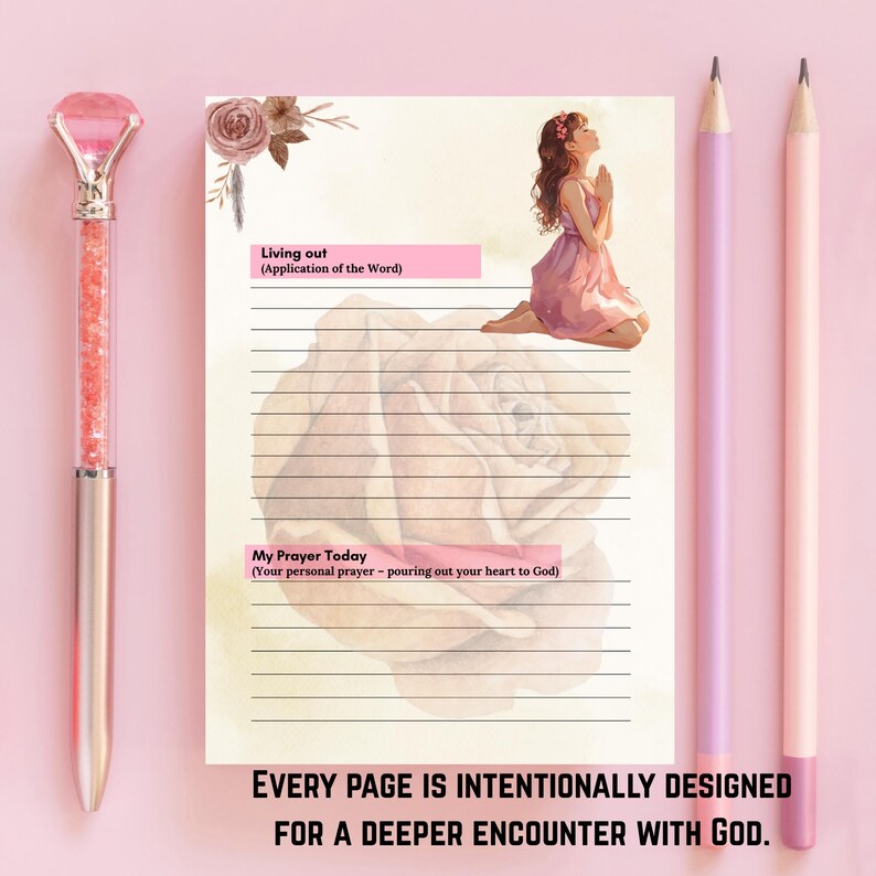 May include: A pink and silver pen, a lined journal with a floral illustration, and two pencils. The journal has text that reads "Living out" and "My Prayer Today". The bottom of the journal reads "EVERY PAGE IS INTENTIONALLY DESIGNED FOR A DEEPER ENCOUNTER WITH GOD."