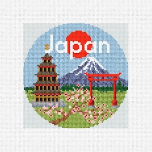 May include: A cross-stitch design featuring a red sun, a pagoda, a red torii gate, and Mount Fuji with cherry blossoms. The text "Japan" is in white letters.