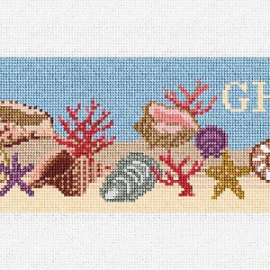 May include: Needlepoint design featuring a beach scene with seashells, coral, and starfish on a sandy shore, under a blue sky. The design includes the letters "GHG" in a light beige color.