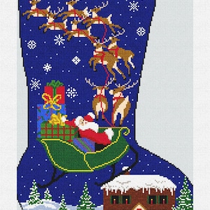May include: A blue Christmas stocking with a green top and the name "JULIE". Santa Claus in a green sleigh pulled by reindeer, with a snow-covered house and Christmas trees at the bottom. Presents are also visible.