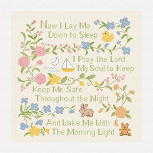 May include: A white background with a floral border and the text "Now I Lay Me Down to Sleep I Pray the Lord My Soul to Keep Keep Me Safe Throughout the Night And Wake Me With The Morning Light".