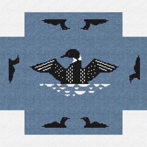 May include: A blue and white cross-stitch pattern featuring a loon with its wings spread, surrounded by five smaller loons in flight. The background is a light blue color.