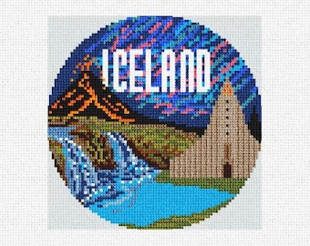 May include: A circular cross-stitch design featuring a colorful depiction of Iceland. The design includes a volcano, a waterfall, a church, and the aurora borealis. The text "ICELAND" is displayed in white letters.