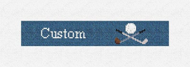 May include: A blue banner with the word "Custom" in white text and a white golf ball with two crossed golf clubs in brown and black.