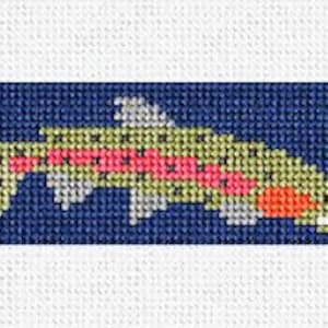May include: A blue and white striped fabric with a design of two fish and a fishing lure. The fish are brown, green, and orange. The lure is brown and white.