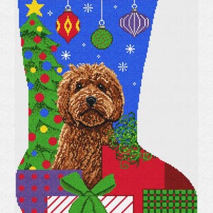 May include: A Christmas stocking featuring a brown dog, Christmas tree, and wrapped gifts. The stocking has a blue background with ornaments and the name "DUSTY" at the top. The gifts have green bows.
