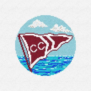 May include: A red and white flag with the letters "CC" on it, against a blue and white background. The flag is flying over a body of water.