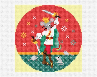 May include: Cross-stitch design of a mouse king in a red circle with snowflakes. The mouse wears a gold crown, white jacket, green cape, and brown boots, holding a sword. Small mice are at the bottom on a green patterned surface.