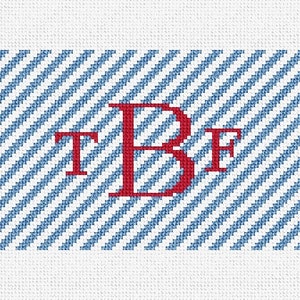 以下が含まれることがあります： 青と白のストライプの背景に、赤い文字「T B F」が書かれています。