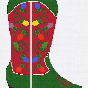 May include: A hand-stitched Christmas stocking shaped like a cowboy boot. The boot is red with green accents and features colorful string lights. The name "JOANNA" is stitched in yellow at the top.