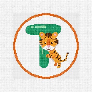 Peut inclure: Une lettre T verte avec un adorable tigre orange et noir qui se cache derrière. La lettre est entourée d'un cercle orange épais.