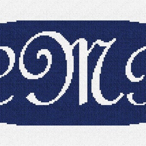 May include: A navy blue, oval needlepoint design featuring the white cursive initials "eMP". The design is set against a white background, highlighting the detailed stitching and the contrast of colours.