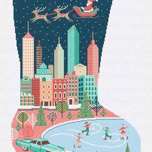 May include: Needlepoint Christmas stocking featuring a winter cityscape with ice skaters, a vintage car, and Santa's sleigh. The name "Sadie" is embroidered at the top. The design includes a dark blue sky with falling snow and colorful buildings.