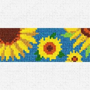 May include: A blue and yellow cross stitch pattern featuring a row of sunflowers. The sunflowers are in various sizes and have brown centers. The background is a solid blue.