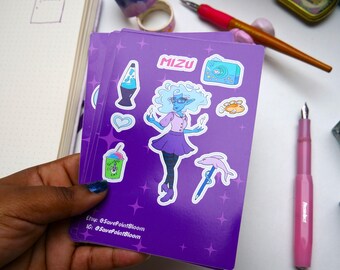 May include: A stack of purple stickers featuring a cartoon character with blue skin, glasses, and a purple skirt. The stickers also include a lava lamp, a camera, and a slushie. The text "Mizu" is on the stickers.