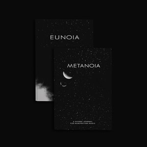 May include: Two black journals with white text and celestial designs. One journal reads "Eunoia" and the other "Metanoia" with crescent moon illustrations. The bottom journal also includes the text "A Guided Journal for Manifesting Magic."