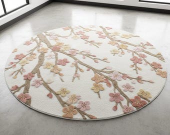 Round Area Rug With a cherry blossom design pink and beige flower and branches