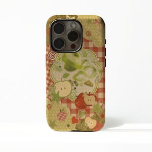 May include: A smartphone case featuring a red and white checkered background overlaid with a pattern of green and red apples, apple slices, small hearts, stars, and swirling line designs in a soft, textured, and layered graphic illustration.