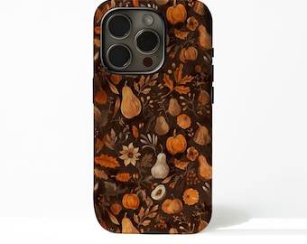 May include: A phone case featuring a fall-themed pattern. The design includes orange pumpkins, pears, and leaves on a dark brown background. The case has a glossy finish and a camera cutout.