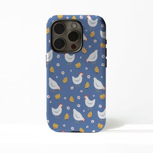 May include: A blue phone case featuring a repeating pattern of white chickens, yellow chicks, and small white flowers. The case has a camera cutout and black side buttons. The design is whimsical and suitable for a farm or animal lover.