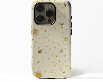 May include: A phone case with a whimsical bee and daisy pattern. The case is off-white with yellow bees, daisies, stars, and hearts. The case has a camera cutout and black side buttons.