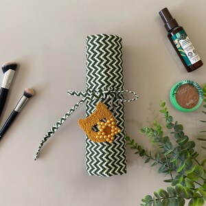 makeup brush holder,handmade brush organizer,customizable makeup storage,cosmetic organizer,fabric brush holder,portable makeup storage