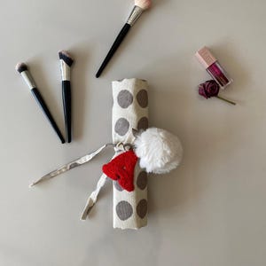 makeup brush holder,handmade brush organizer,customizable makeup storage,cosmetic organizer,fabric brush holder,portable makeup storage
