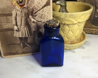 A Rare Little Gem Antique UDCO Blue Embossed Quilted Triangle Poison Bottle