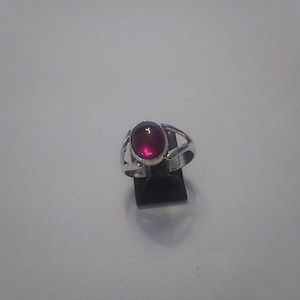 Ruby cavachon rings said in sterling silver size 6 and 1/2