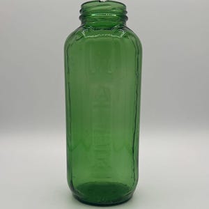 1950&#39;s green glass water bottle